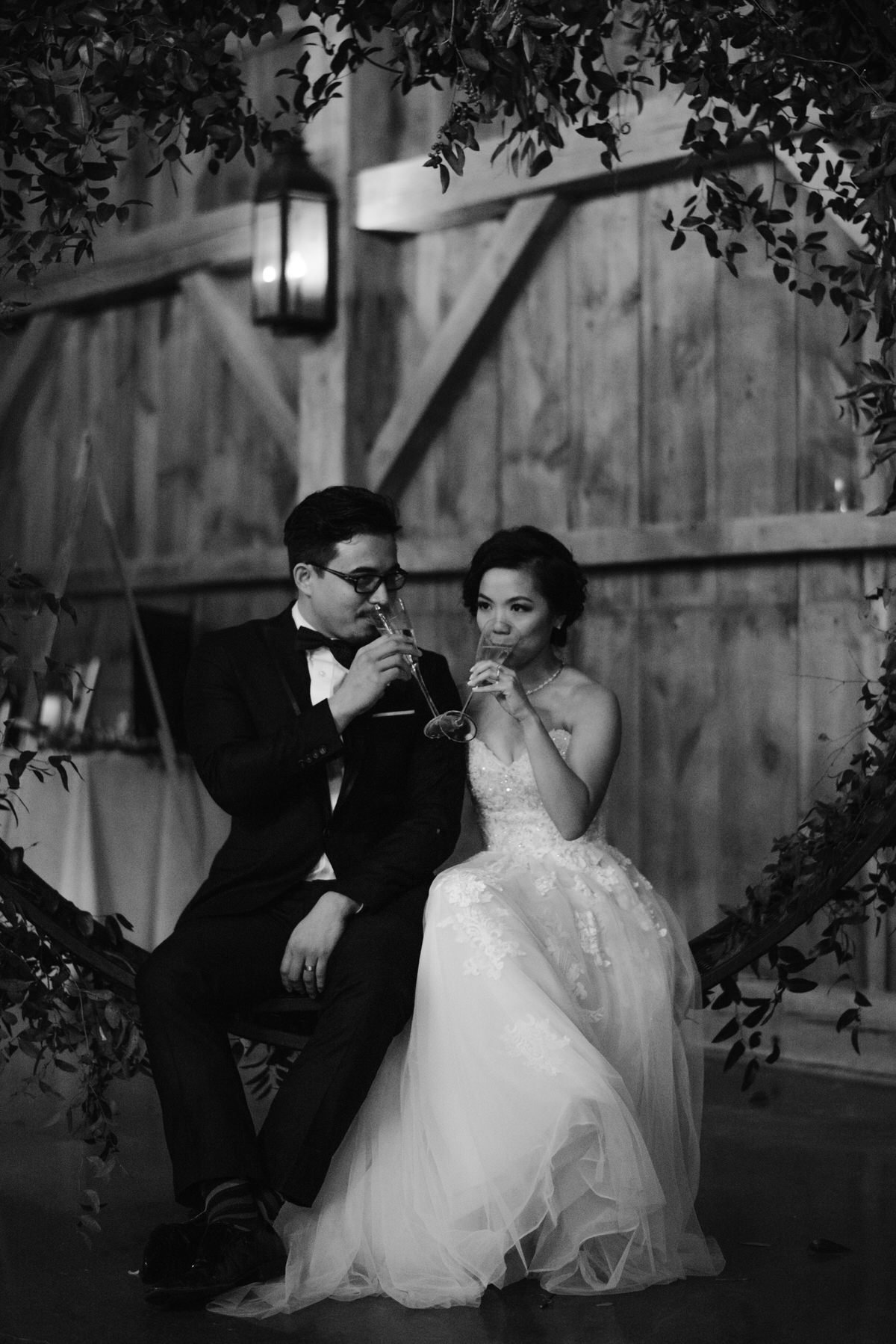 bride and groom enjoy toast together