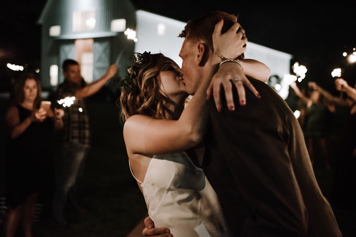 romantic kiss during sparkler exit
