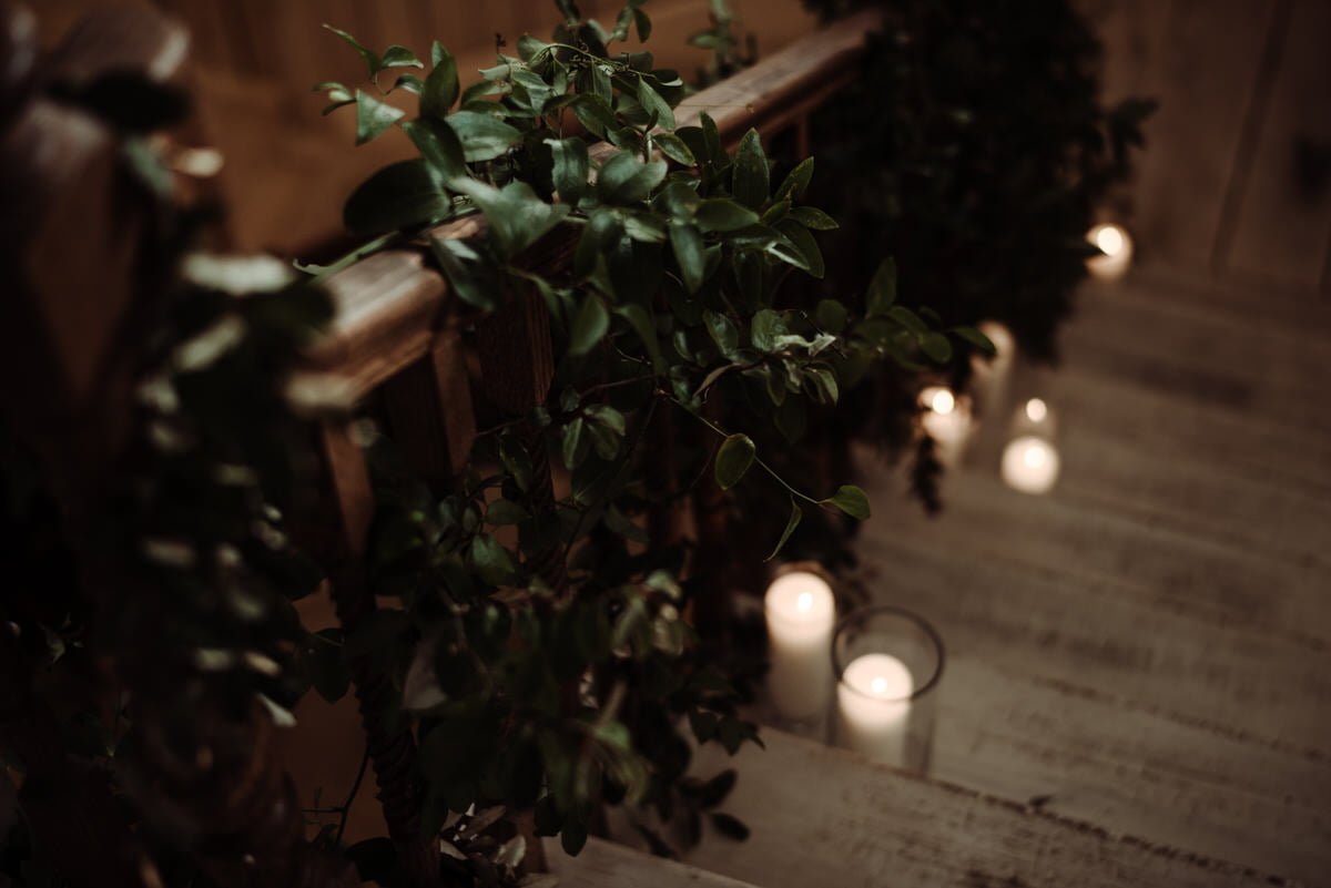 candlelit stairway at wedding