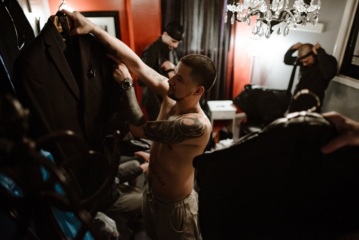 tattood groom getting ready