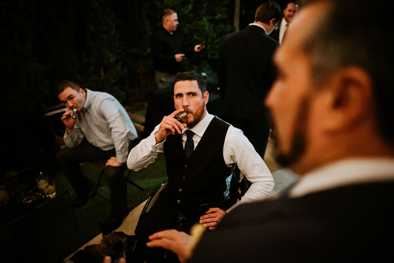 groom smoking cigar