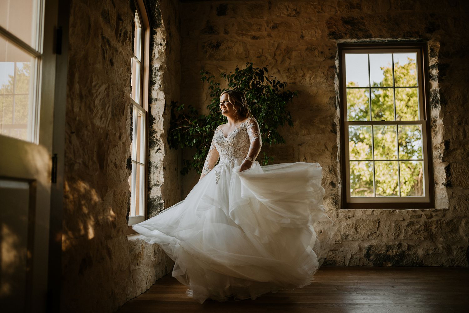 bride spinning around in dress