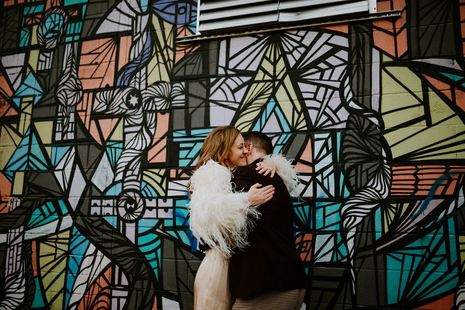 colorful mural engagement session 