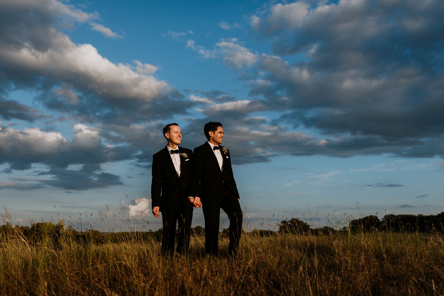 dramatic wedding day portraits of grooms