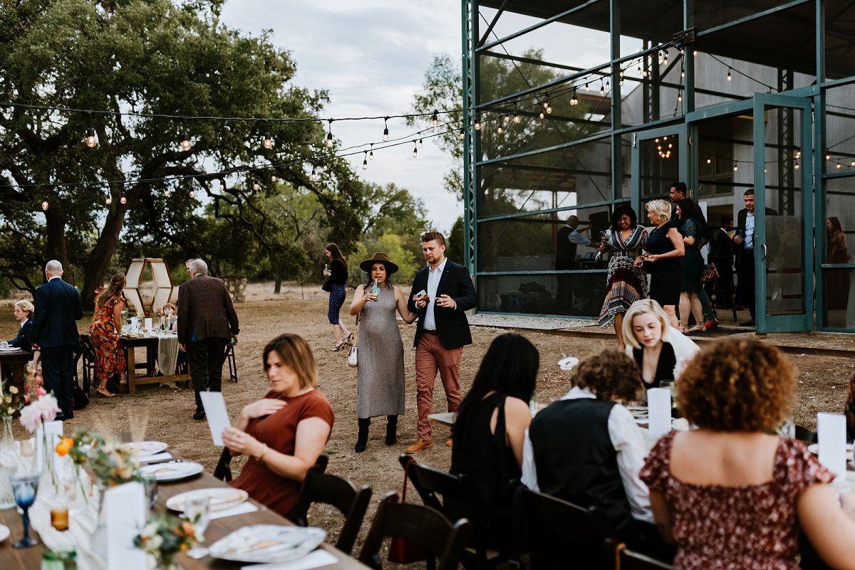 guests walking towards table at reception