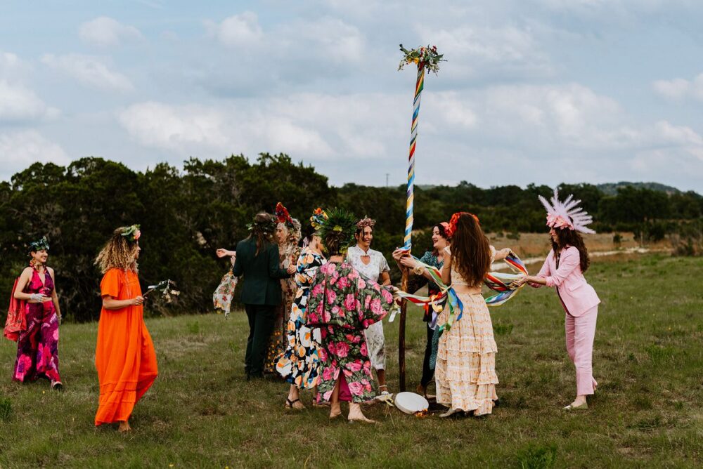 people dancing around during May Pole