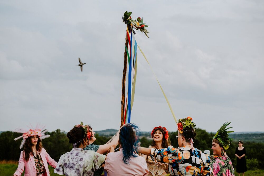 people dancing around during May Pole