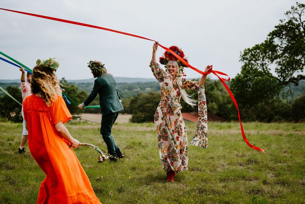 people dancing around during May Pole