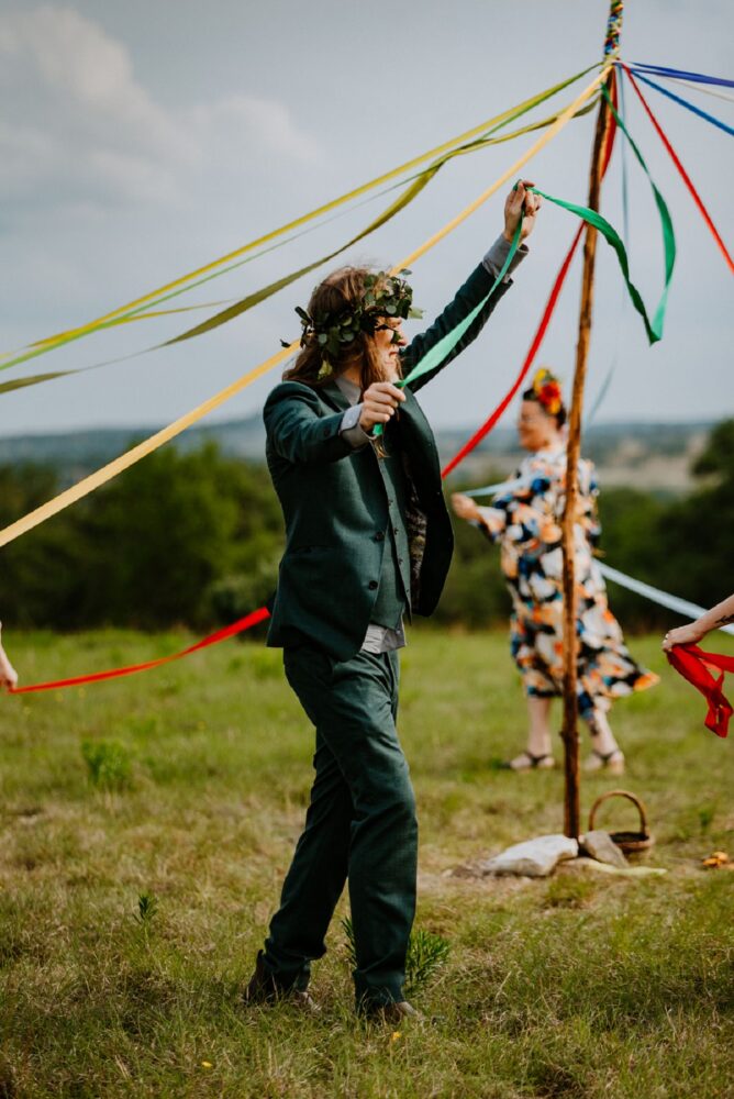 people dancing around during May Pole