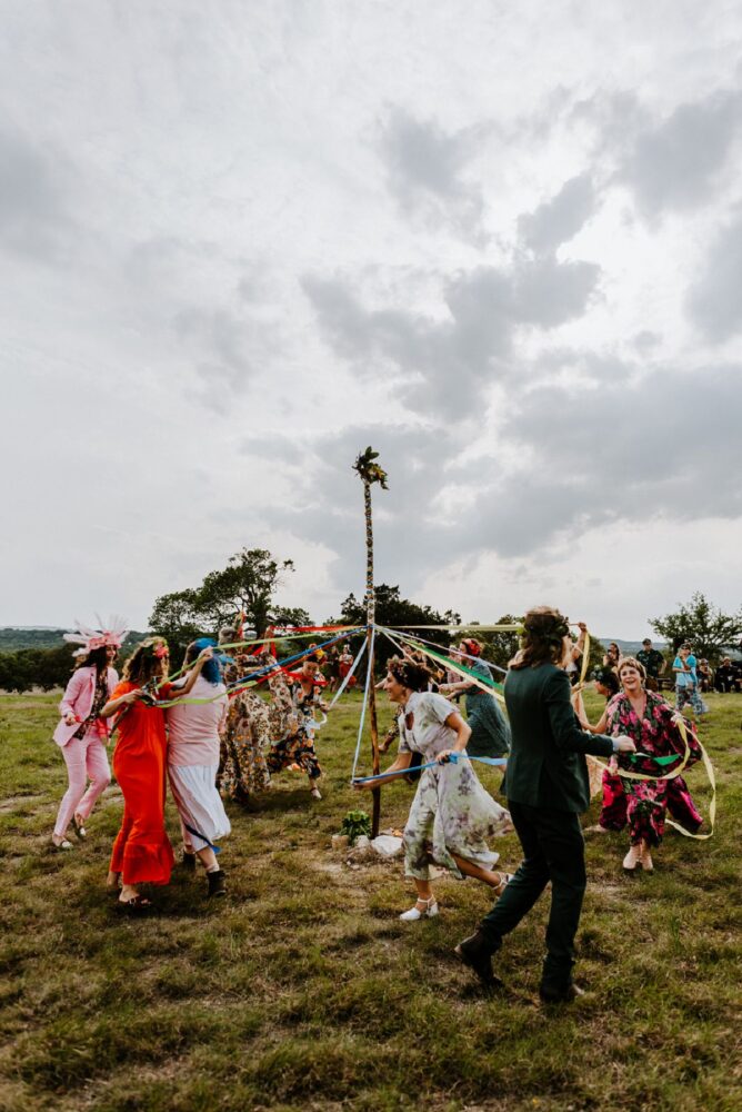 people dancing around during May Pole