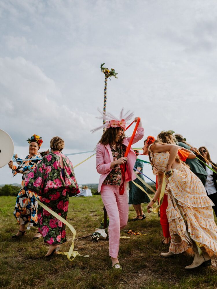 people dancing around during May Pole