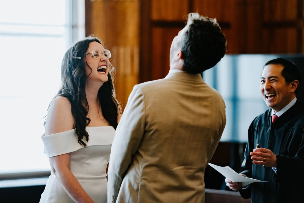bride smiling during elopement in courthouse