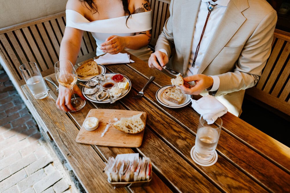 couple eating dinner at clarks oyster bar 