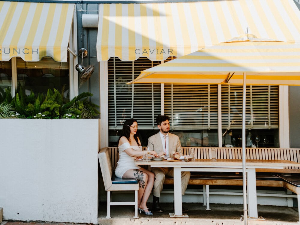 couple sitting down eating at clarks oyster bar