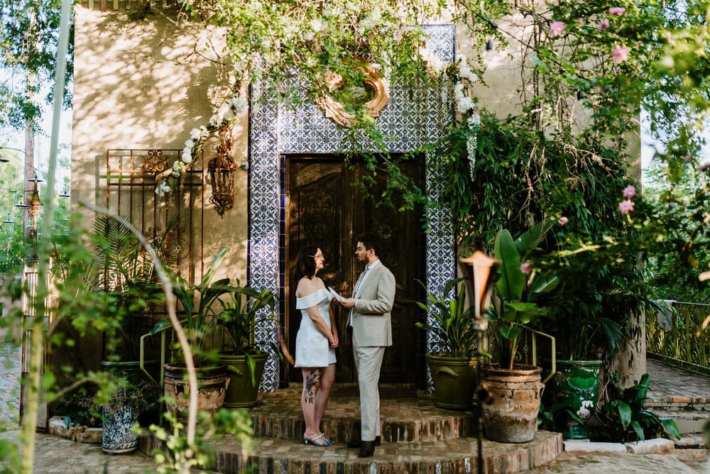 couple sharing private vows at jennifers garden in austin