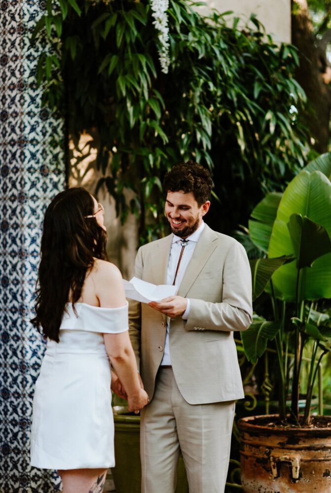 couple sharing private vows at jennifers garden in austin