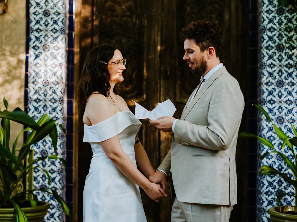 couple sharing private vows at jennifers garden in austin