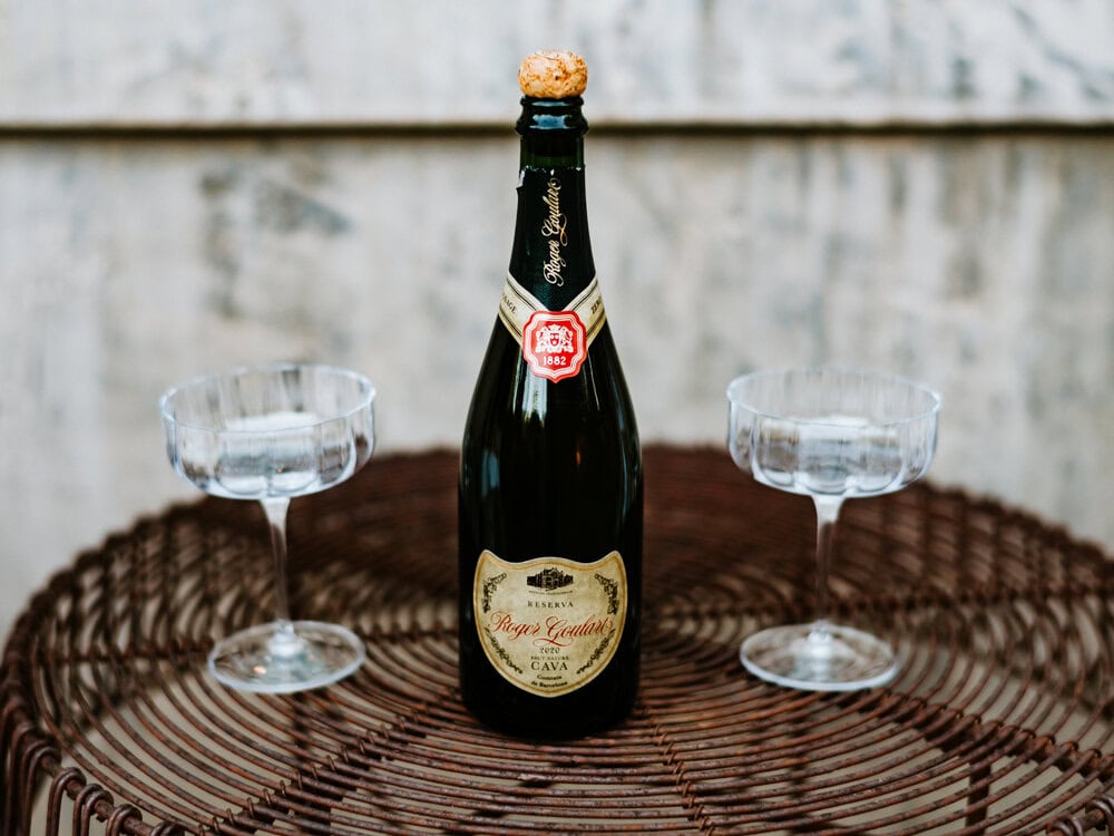 bottle of cava with two glasses