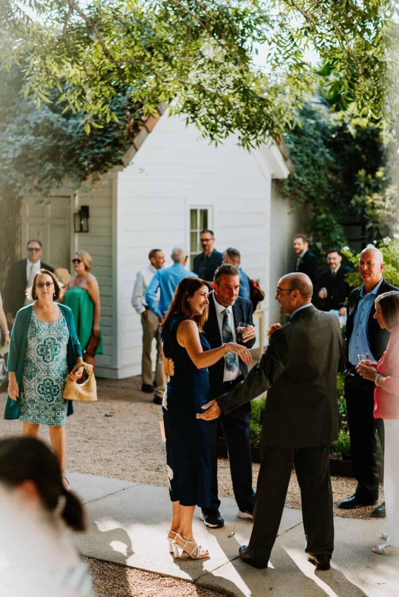 wedding guests coming into venue for ceremony
