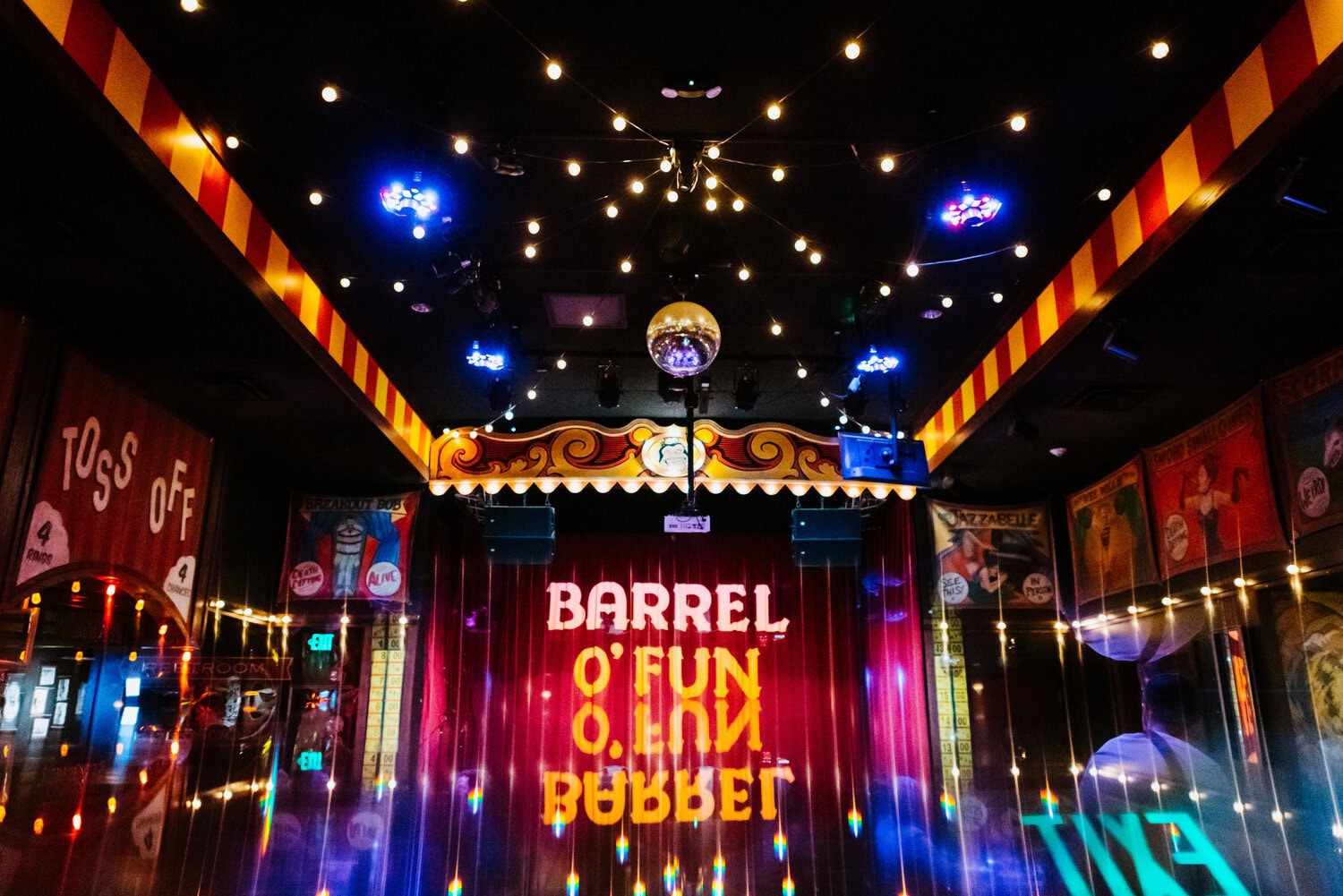 wide photo with prism effect inside Barrel O' Fun in Austin